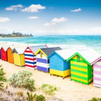 Beautiful Bathing houses on white sandy beach at Brighton beach in Melbourne